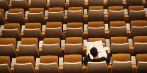 student in lecture hall