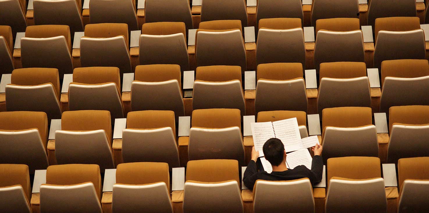 student in lecture hall